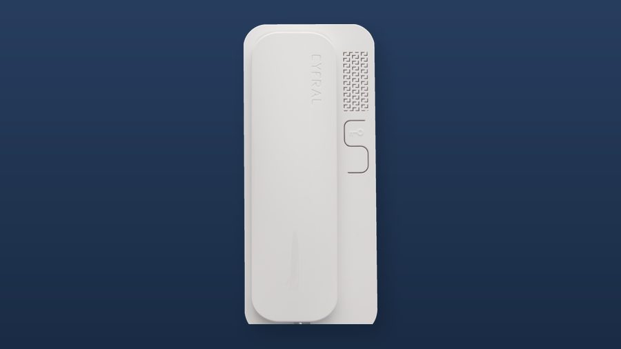 A white wall-mounted intercom handset with a coiled cord